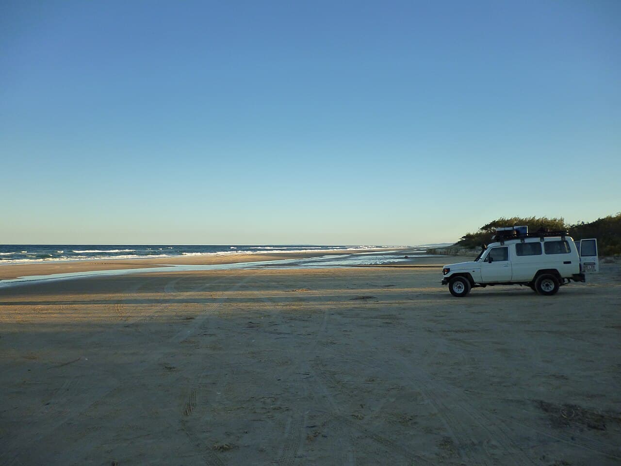 4WD on the eastern beach of K’gari / Fraser Island — a tide and permit week, not a trophy